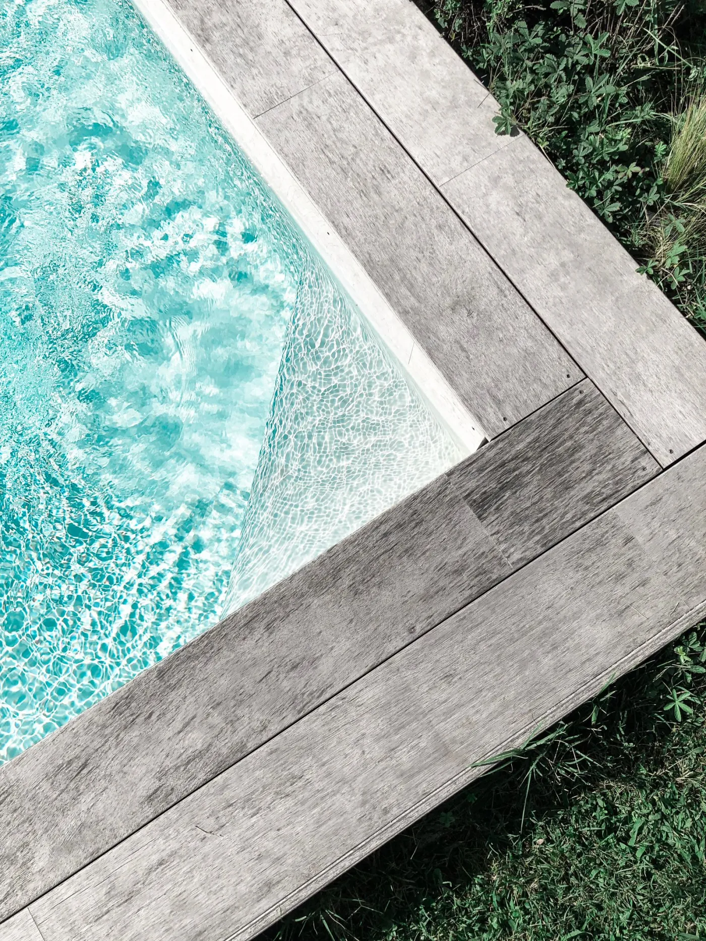 Decorative stamped concrete surface protected by sealer